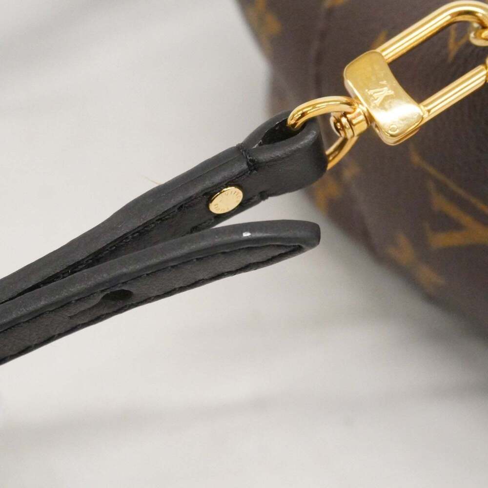 LOUIS VUITTON Brown Monogram Backpack - Picture 14 of 16